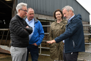 Seán Kelly and ESB representatives visit Dinny Galvin's Farm Lispole - Image taken outside farm shed with gate in background